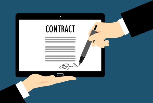 An illustration of two hands signing a digital contract on a tablet, symbolizing a modern legal agreement.