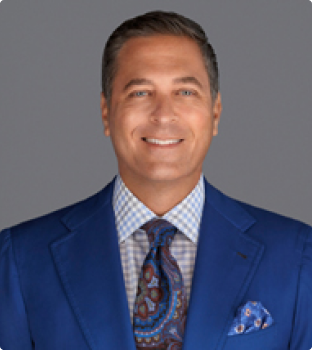 A professional headshot of attorney Jeremy Alters smiling confidently.