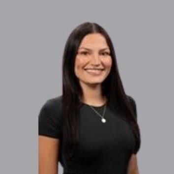 A professional headshot of attorney Madison Gebig smiling.
