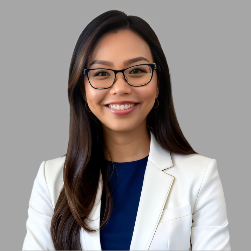 Portrait of Khanh Le, COO of Berman Law Group, in a suit against a grey background.